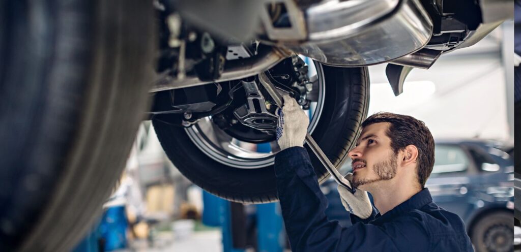 a man working on a car
